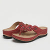 Vinklad Flip-Flop Sandal Med Blommor Detalj